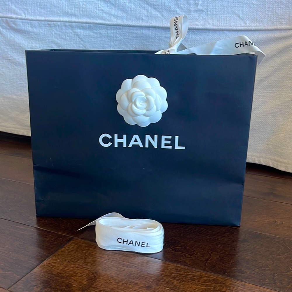 Chanel small shopping bag with flower and two ribbons